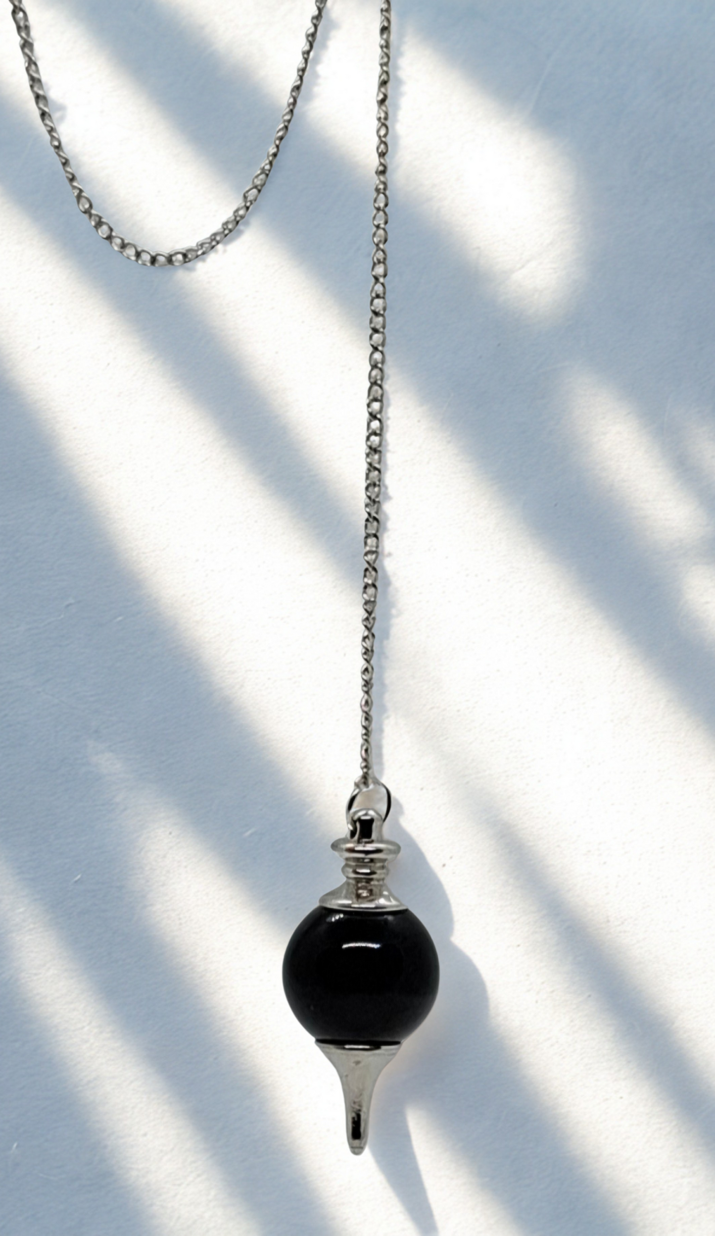 Péndulo varias piedras